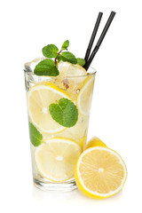 Glass of lemonade with lemon and mint