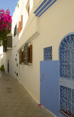 White wall with details in blue, Asilah (Morocco)