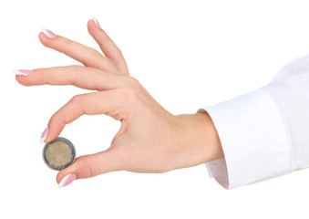 Woman hand with euro coin, isolated on white