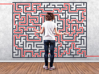 Girl before a labyrinth