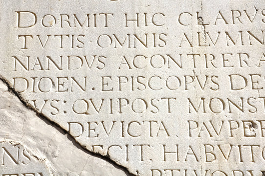 Exhibition of a Latin Epitaph from a Tombstone in the Seville Cathedral