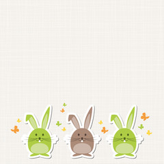 Drei Osterhasen mit Schmetterlingen