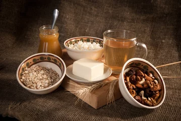 Fotobehang healthy meal with bread,tea and cereals © zakrevski