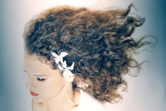 Curly hair elegant woman hairstyle