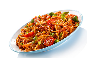 Pasta with meat, tomato sauce, parmesan and vegetables