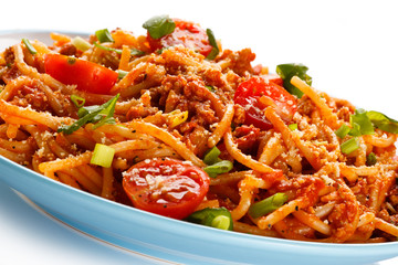 Pasta with meat, tomato sauce, parmesan and vegetables