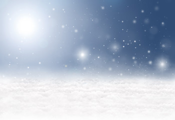 Winter background with snow, snowflakes, sunshine and a blue sky