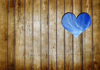 Heart shape in old wooden fence
