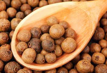 Background texture of whole allspice(jamaica pepper)