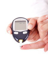 Diabetes patient measuring glucose level blood