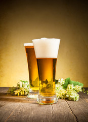 Glass of beers on wooden table