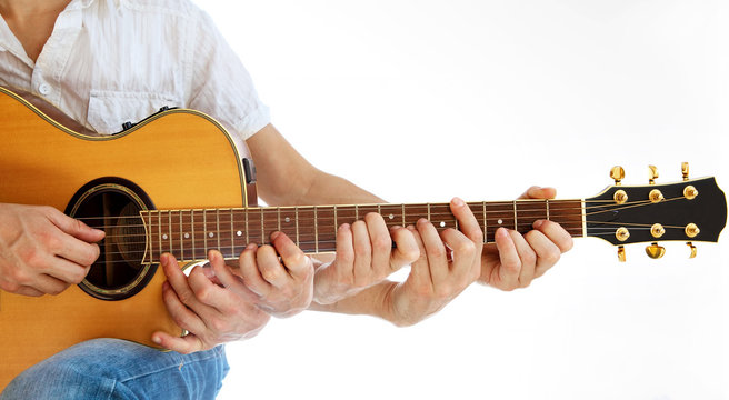 Go Folk - Multiple hands on acoustic guitar
