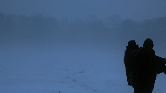 Fairy tale couple on snowfall