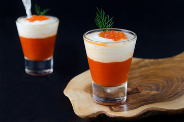appetizer of sweet pepper, cream and red caviar