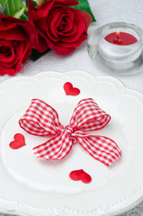 Festive table setting Valentine's Day, hearts, ribbon, roses