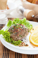 a large piece of juicy meat with spices