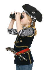 Little girl pirate looking away through binoculars