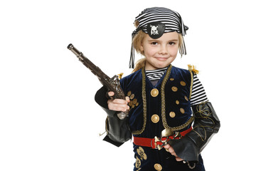 Little girl wearing pirate costume holding a gun