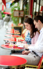 Couple in a Parisian outdoor cafe