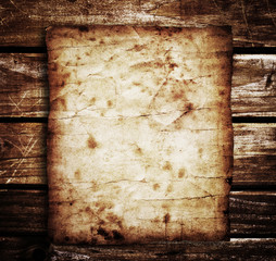 old paper on brown wood texture with natural patterns