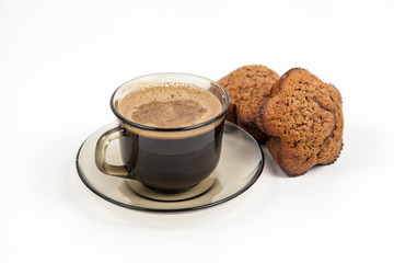 Closeup of chocolate muffin and a cup of coffee