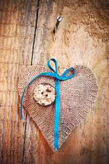 Decoration on Wooden background with fabric Heart