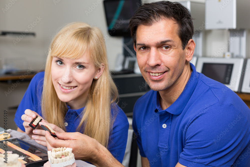 Canvas Prints Two dental technicians choosing the right colour