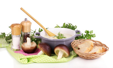 Mashed potatoes in saucepan with ingredients isolated on white