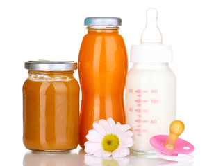 Baby food, bottle and juice isolated on white