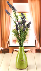Decorative ceramic vase with lavender
