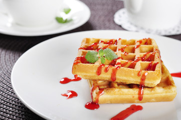 Waffles with strawberry jam