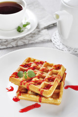Waffles with strawberry jam