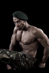 Obraz na płótnie Canvas muscled man on a black background
