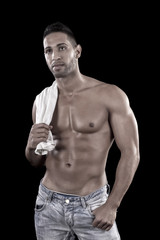 Fototapeta premium muscled man on a black background