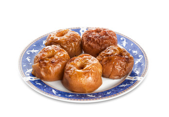 Baked apples in blue plate