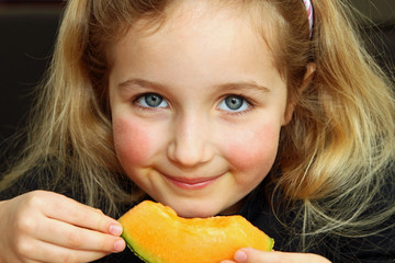 Girl Loving Cantaloupe