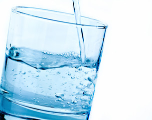 glass with pouring water