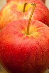 Fresh apples on the wooden floor