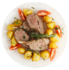 Rack of lamb with fried potatoes isolated on white