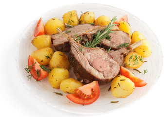 Rack of lamb with fried potatoes isolated on white