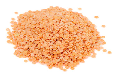 Uncooked lentils on white background