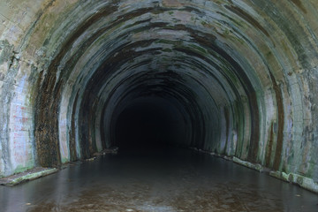 Naklejka premium Dark abandoned Tunnel