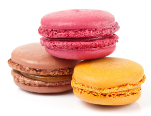 Three colorful macarons isolated on white