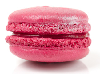 Pink macaron cake on white background