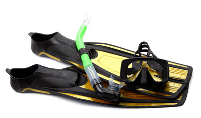 Mask, snorkel and flippers with water drops