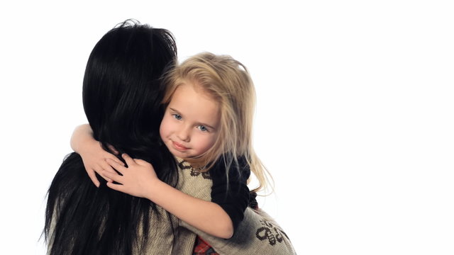 little girl hugging her mother