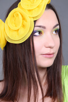 Portrait Of Dreaming Woman With Yellow Accessory