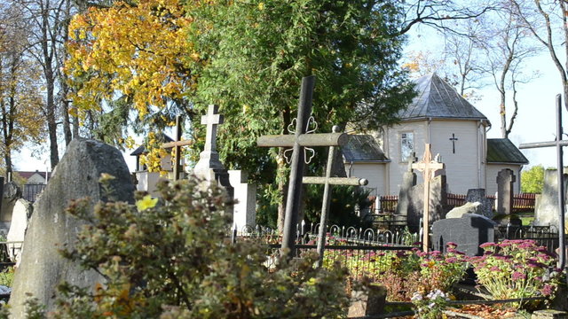 rural graveyard cross  church autumn tree smell death