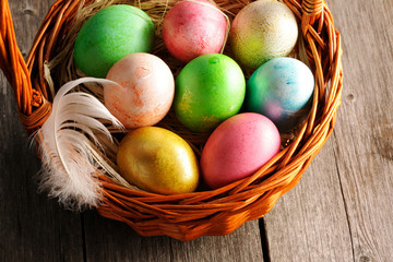 Colored easter eggs in basket