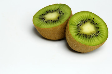 Two part of kiwi fruit isolated on white background